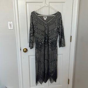 20’s Flapper-style dress. Sequin, beading and tassel bottom